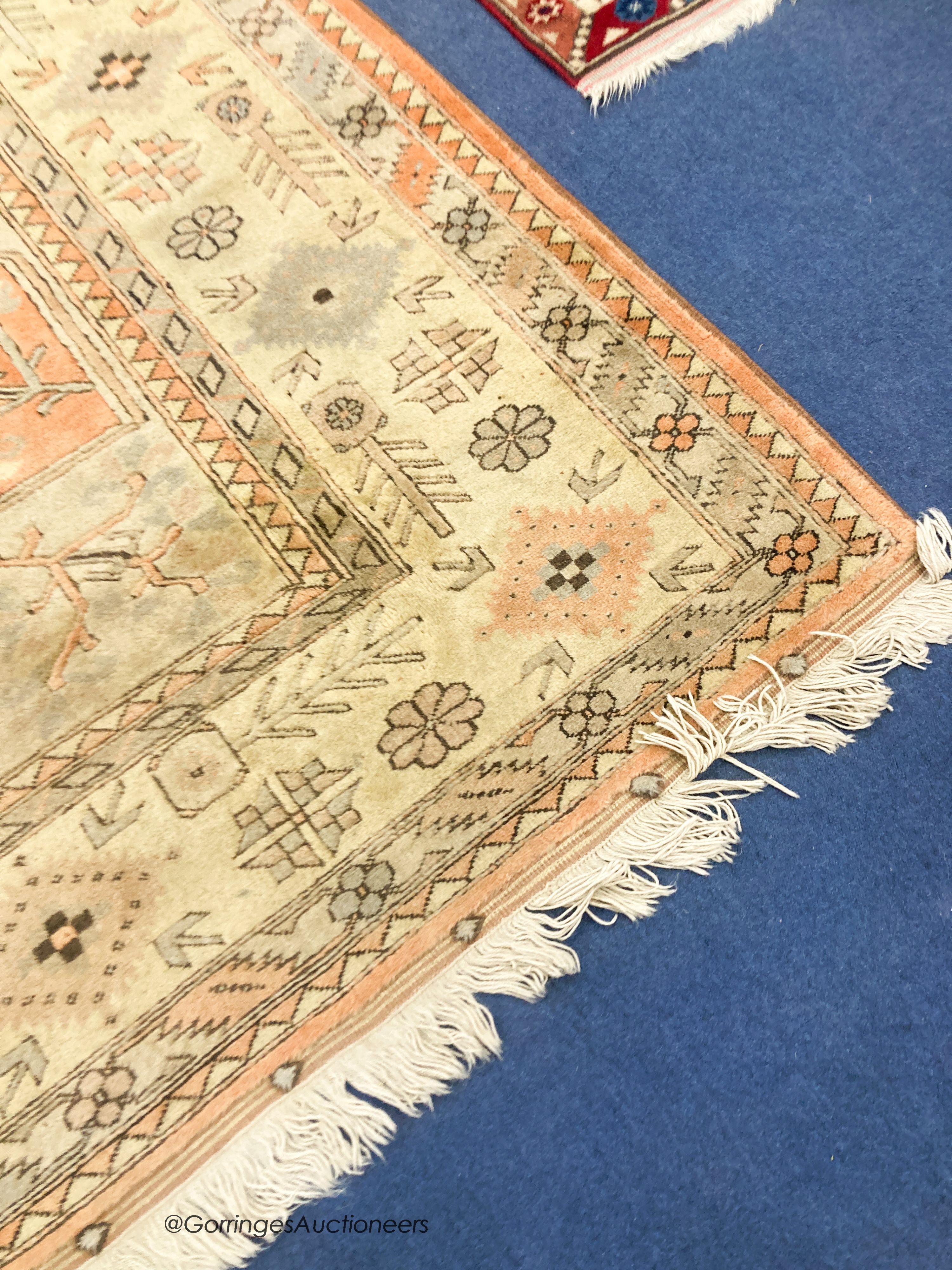 A large Caucasian Turkish design fawn ground carpet, 420 x 300cm - Image 2 of 7