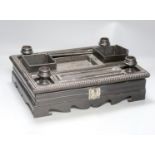 A 19th century Indo-Colonnial ebony desk stand, single drawer with engraved white metal escutcheon,