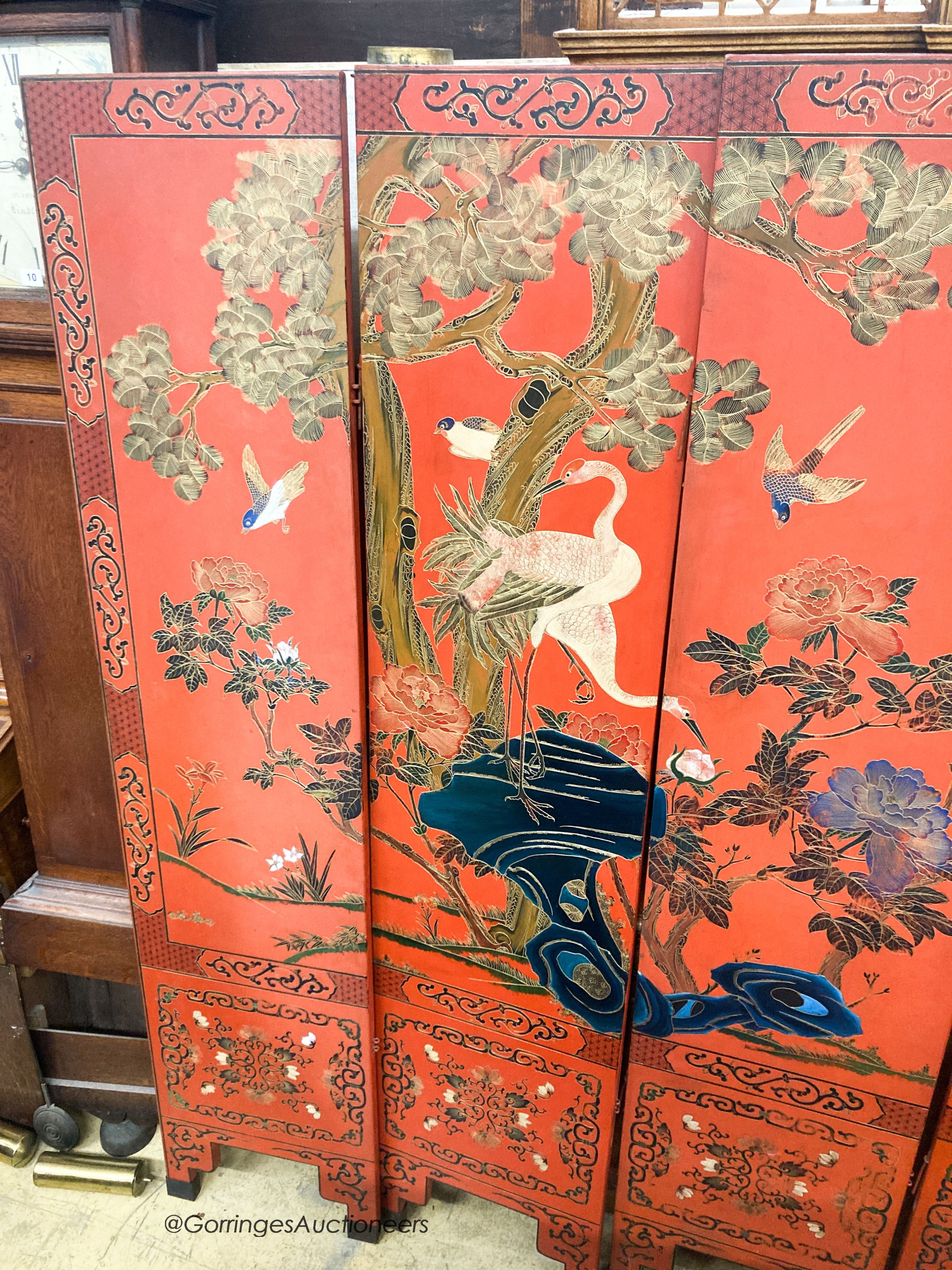 A Chinese red lacquered six fold screen, each panel W.41cm H.184cm - Image 2 of 4