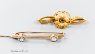 An Edwardian 15ct gold and sapphire set flower head bar brooch, 41mm, gross 2.6 grams and a 9ct and