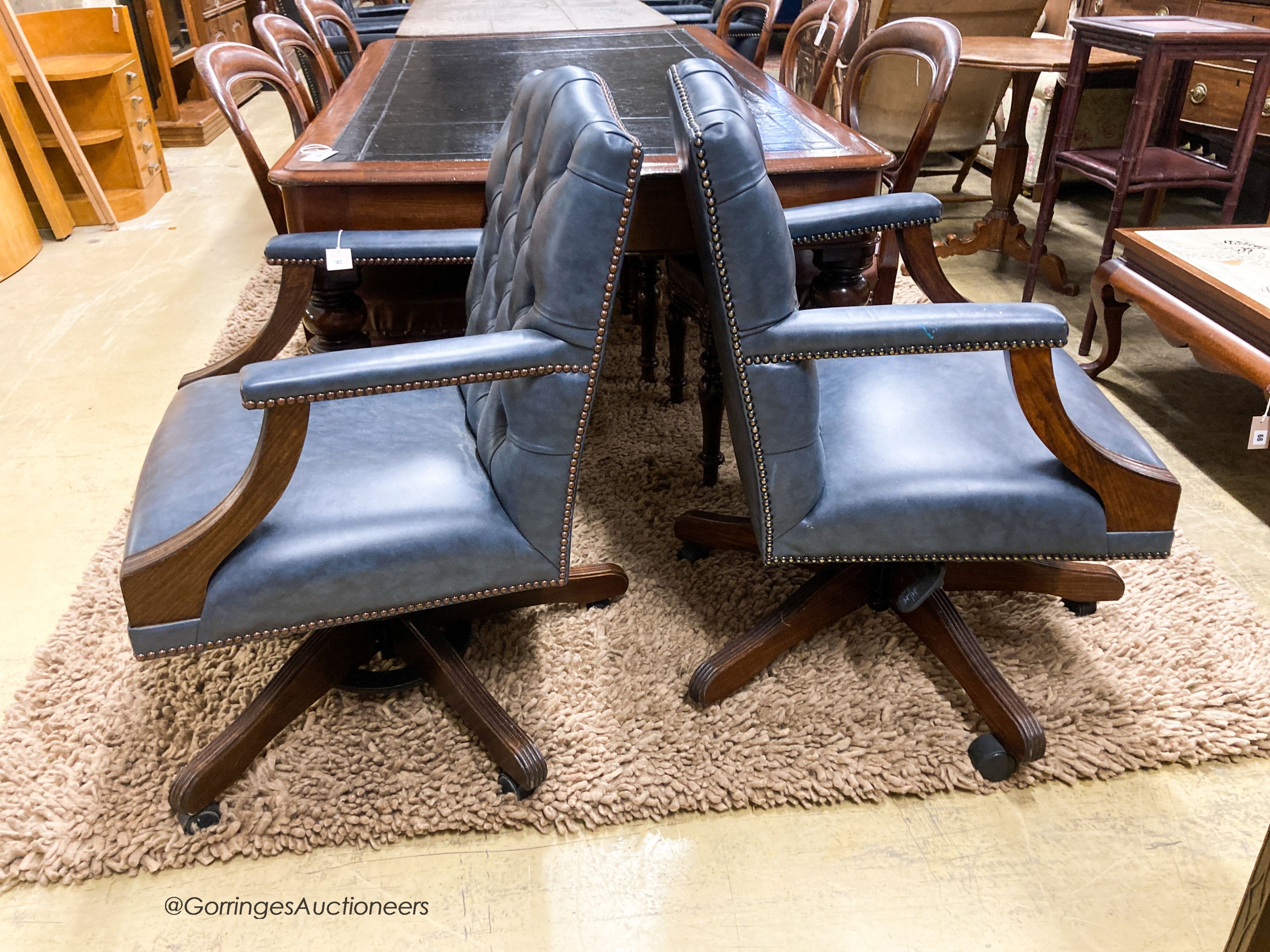 A pair of reproduction beech buttoned blue leather swivel desk chairs, width 60cm, depth 55cm, - Image 3 of 3
