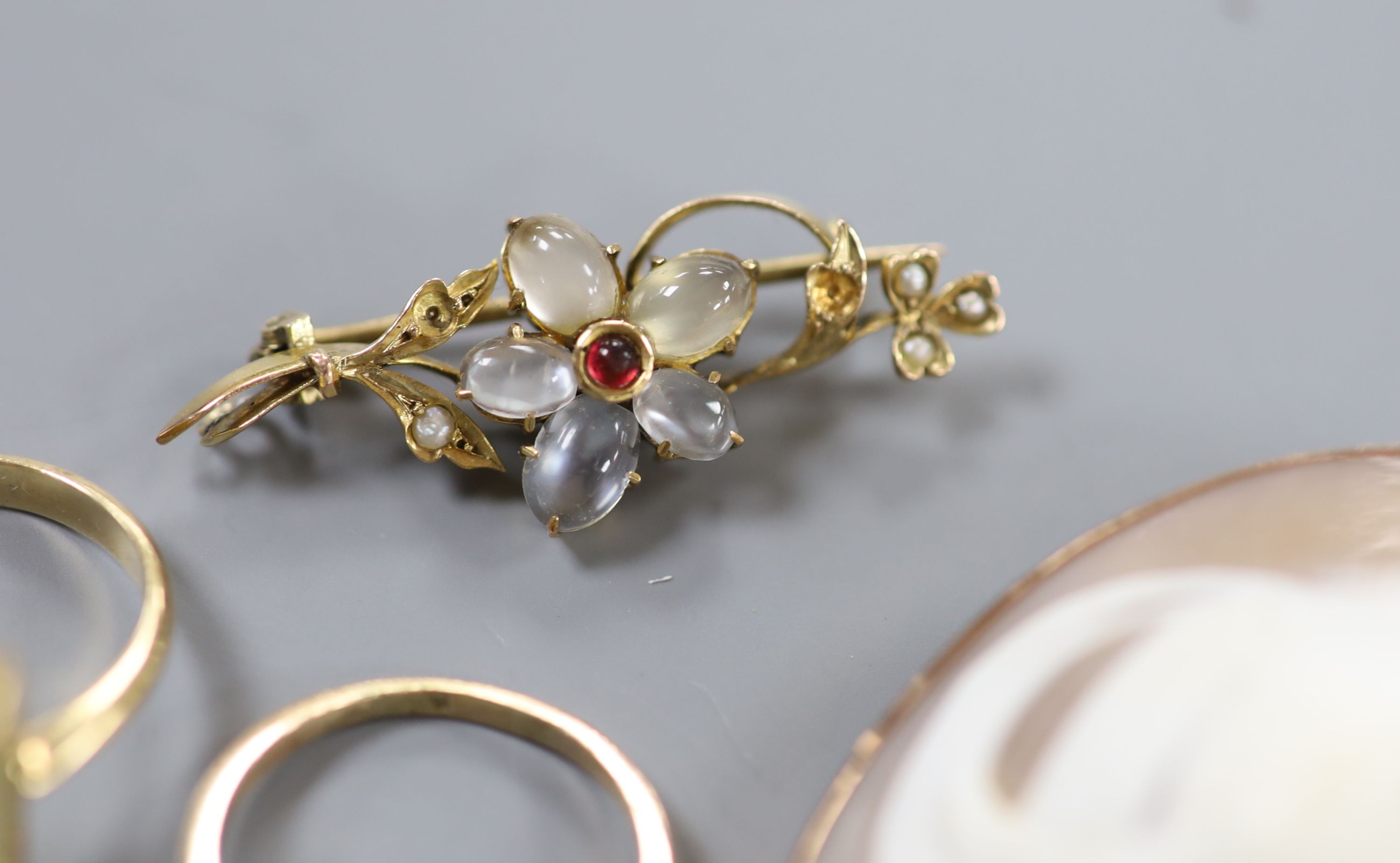 A 9ct gold and citrine set ring, two other gem set rings, a 9ct mounted cameo brooch, a yellow - Image 3 of 3