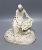 A Parian mother and child group, height 29cm