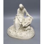 A Parian mother and child group, height 29cm