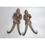 Two Black Forest chamois antler whip hooks, each with carved wood figural 'gnome' surmount,one