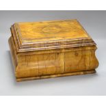 A Jerusalem olivewood casket, bombe shape with inset photograph, width 34cm