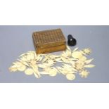 A small quantity of Victorian bone gaming counters, contained within straw work box and a dice