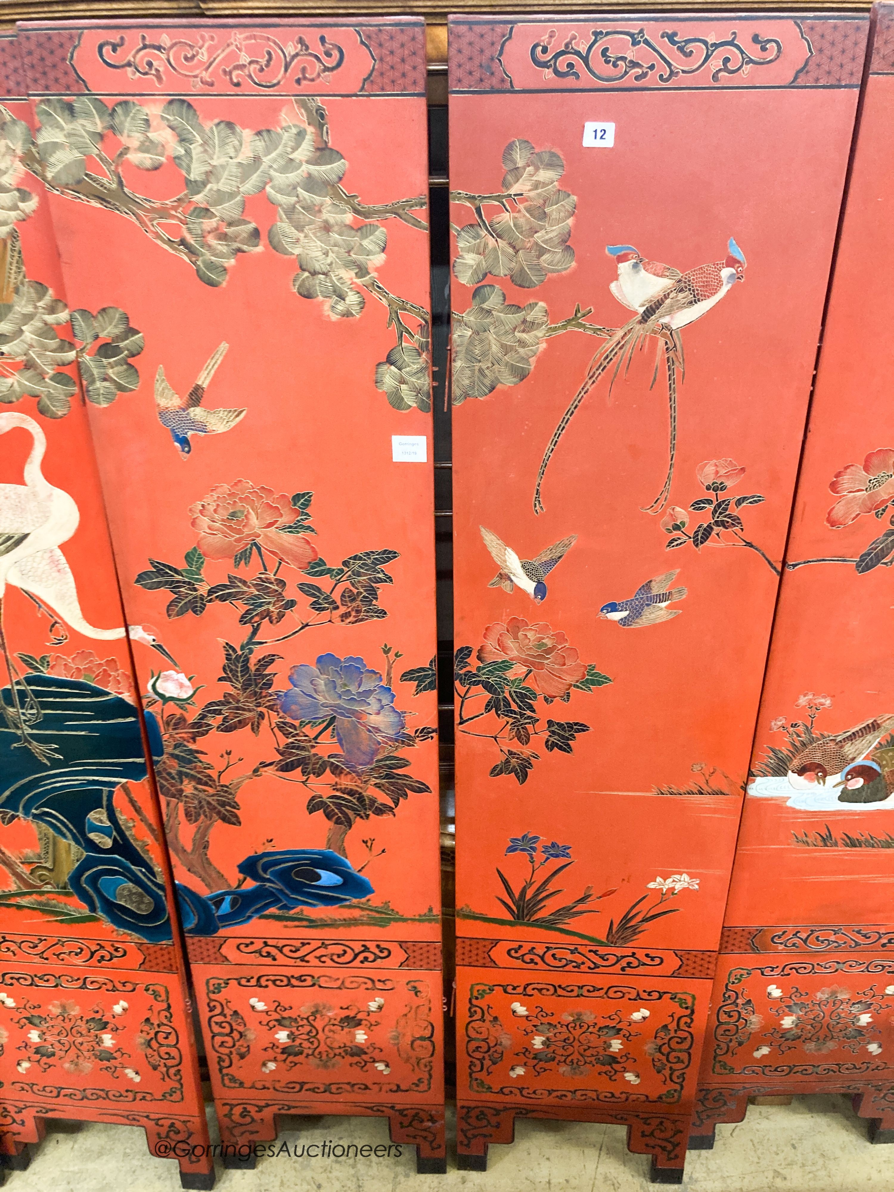 A Chinese red lacquered six fold screen, each panel W.41cm H.184cm - Image 3 of 4