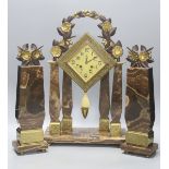 An Art Deco Brazilian onyx clock garniture, Marti movement countwheel striking on a bell, stamped,