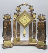 An Art Deco Brazilian onyx clock garniture, Marti movement countwheel striking on a bell, stamped,