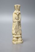 A Japanese walrus ivory figure of an immortal, early 20th century, 13cm