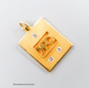 A yellow metal and three stone diamond set "YPO" initialled pendant, 20mm, gross 7.5 grams.