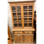 A reproduction oak bookcase cupboard, width 97cm, depth 43cm, height 190cm