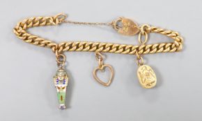 An Edwardian 15ct gold, curb link charm bracelets, hung with three assorted charms, gross weight