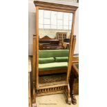 A Victorian Arts & Crafts oak cheval mirror, W.70cm H.172cm