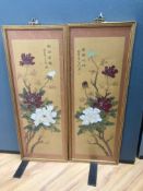 A pair of Chinese fabric panels decorated with chrysanthemums inscription and red sea, 74 x 25cm,