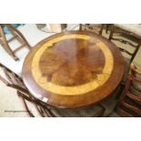 A parquetry inlaid circular centre table, 112cm diameter