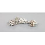 A modern suite of sterling and cultured pearl cluster jewellery, of vineous design, comprising a