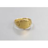 A George V 18ct gold signet ring, size V, 6 grams.