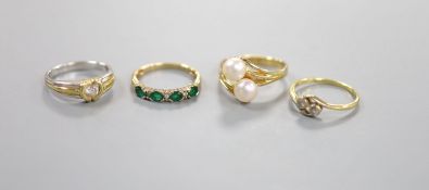 Two 18k and diamond set rings, including solitaire and two stone crossover, sizes N/O & P, gross 6.