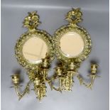 A pair of late 19th century French cast brass three sconce girandoles, height 42cm