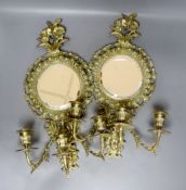 A pair of late 19th century French cast brass three sconce girandoles, height 42cm
