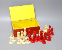 A 19th century red stained and natural ivory chess set, Kings 8.2 cm