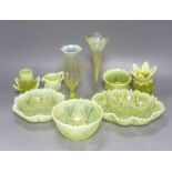 A group of assorted vaseline glass items, tallest 20cm