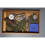 A collection of military cap badges, 2 ARP badges (silver), a policeman's whistle etc.