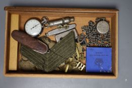 A collection of military cap badges, 2 ARP badges (silver), a policeman's whistle etc.