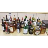 A large quantity of assorted spirits, etc., 39 bottles