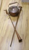 A large Victorian copper kettle with cover, 43cm including handle, and two copper hunting horns