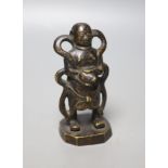 A 19th century Chinese bronze figure of a boy, 12cm