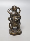 A 19th century Chinese bronze figure of a boy, 12cm