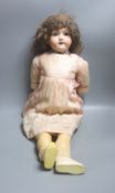 An Armand Marseille bisque headed doll