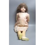 An Armand Marseille bisque headed doll