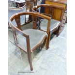 Two Edwardian mahogany tub frame salon chairs