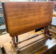 A Victorian walnut Sutherland table, W.91cm H.73cm