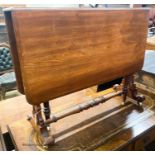 A Victorian walnut Sutherland table, W.91cm H.73cm