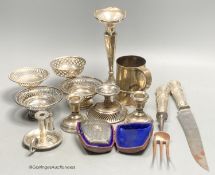 A group of assorted small silver etc. including two pairs of nit dishes, christening mug, spill
