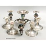 An American sterling three-branch candelabrum, 9.5oz and two pairs of similar dwarf candlesticks,