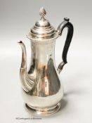 A George V silver baluster coffee pot, Carrington & Co, London, 1927, height 26cm, 20.5oz.