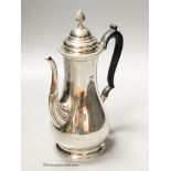 A George V silver baluster coffee pot, Carrington & Co, London, 1927, height 26cm, 20.5oz.