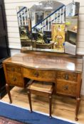 A 1930’s burr walnut dressing table, width 114cm, depth 52cm, height 160cm and a cane topped