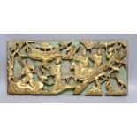 A Chinese carved giltwood plaque, 20 x 46cm