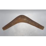 A carved wood boomerang, 19th/20th century, length 50cm