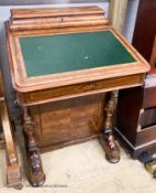 A Victorian banded walnut Davenport, W.54cm. D.54cm H.73cm