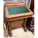 A Victorian banded walnut Davenport, W.54cm. D.54cm H.73cm