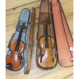 A Stradivarius copy violin and two bows and another bow, both cased, backs 33cm and 30cm