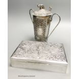 A Thai white metal rectangular cigarette box with embossed lid, 17cm and a Thai white metal